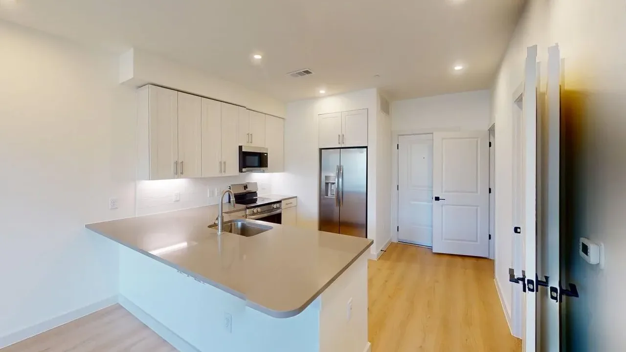 Kitchen of the finished A1 one bedroom at The Parker
