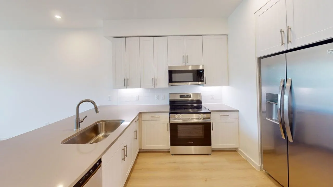 Kitchen of the finished A1 one bedroom at The Parker