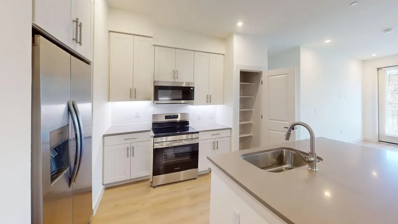 Kitchen of the finished B1 two bedroom at The Parker