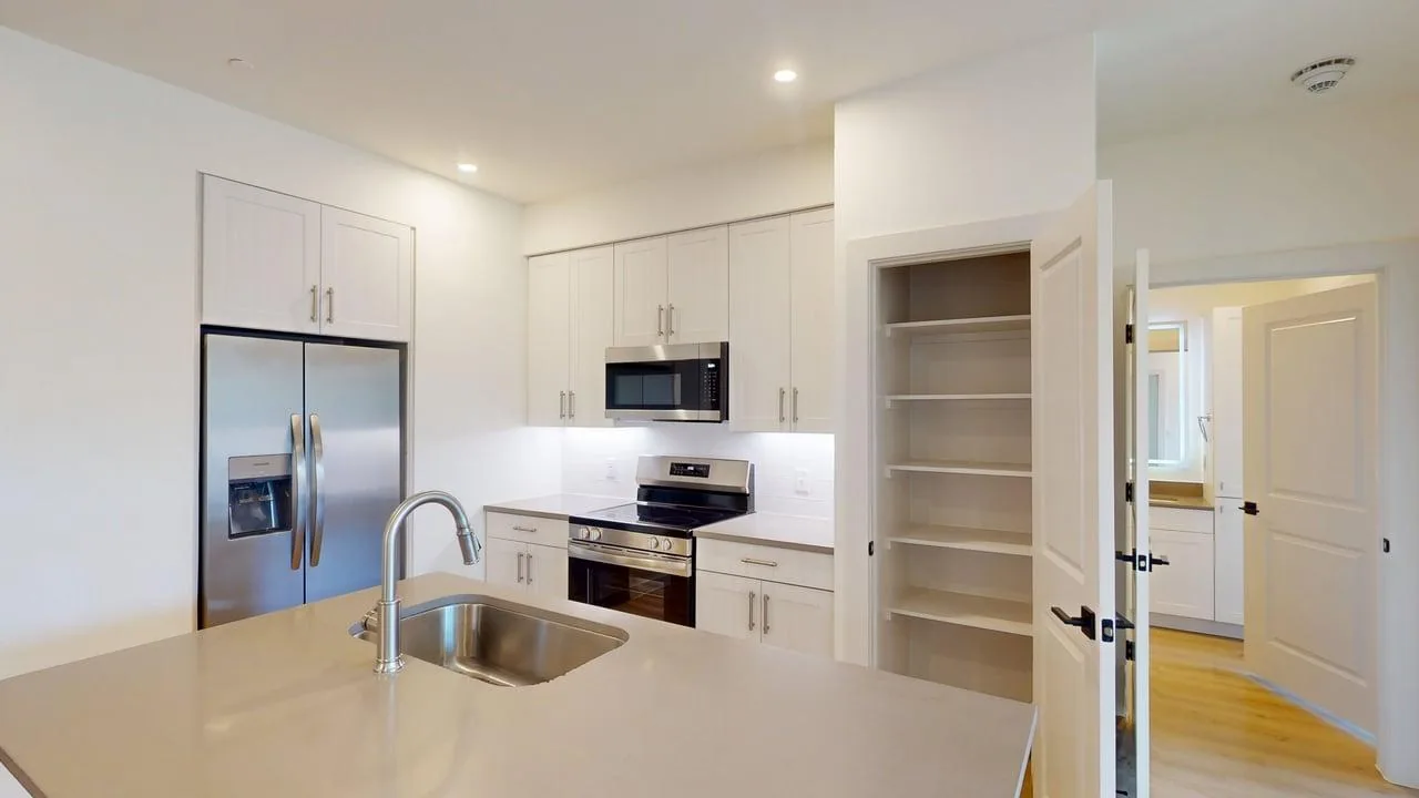 Kitchen of the finished B1 two bedroom at The Parker