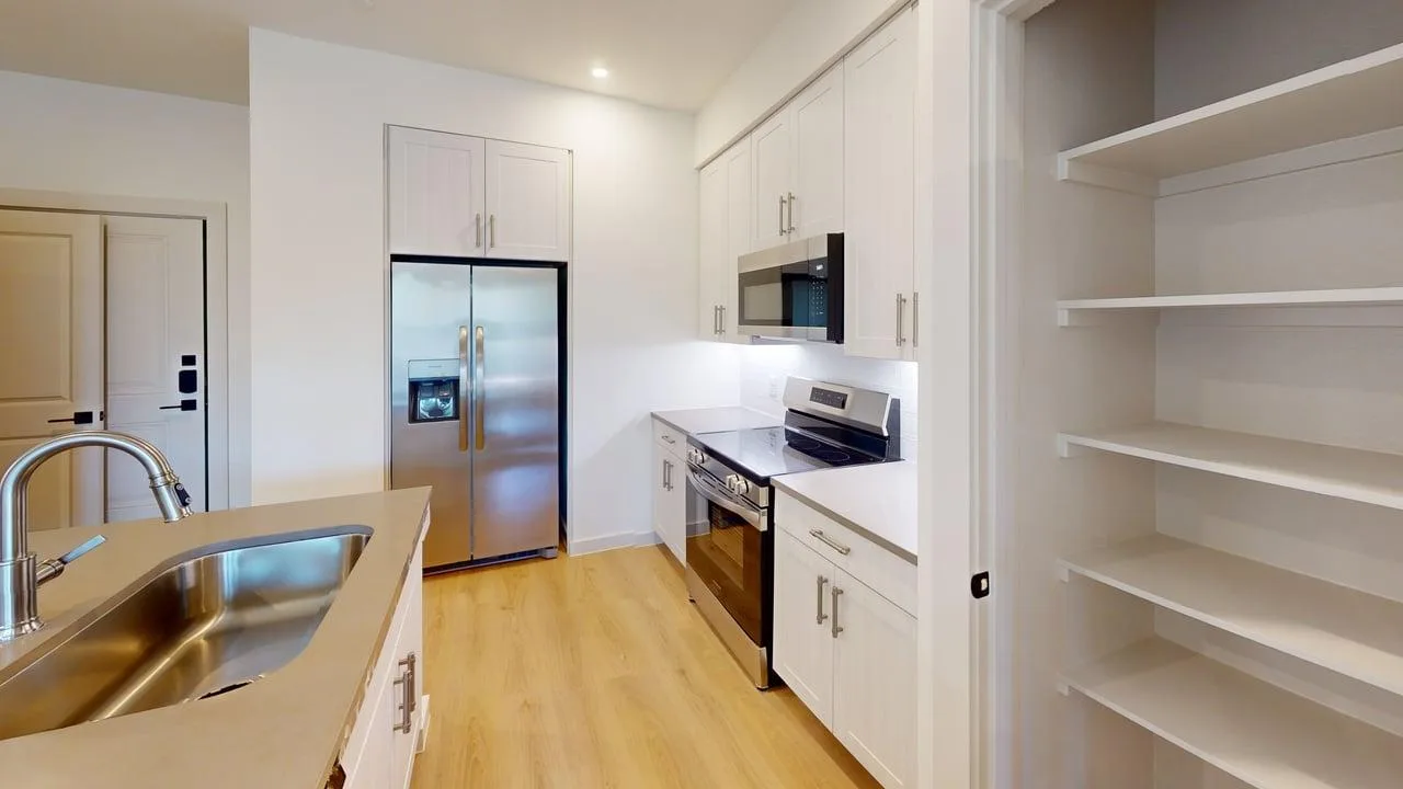 Kitchen of a finished B1 two bedroom at The Parker
