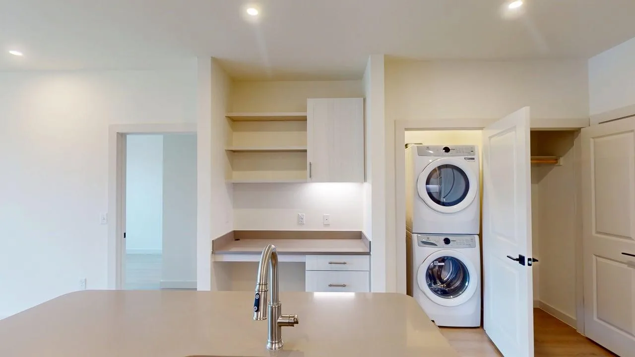 Laundry closet of the finished B1 two bedroom at The Parker