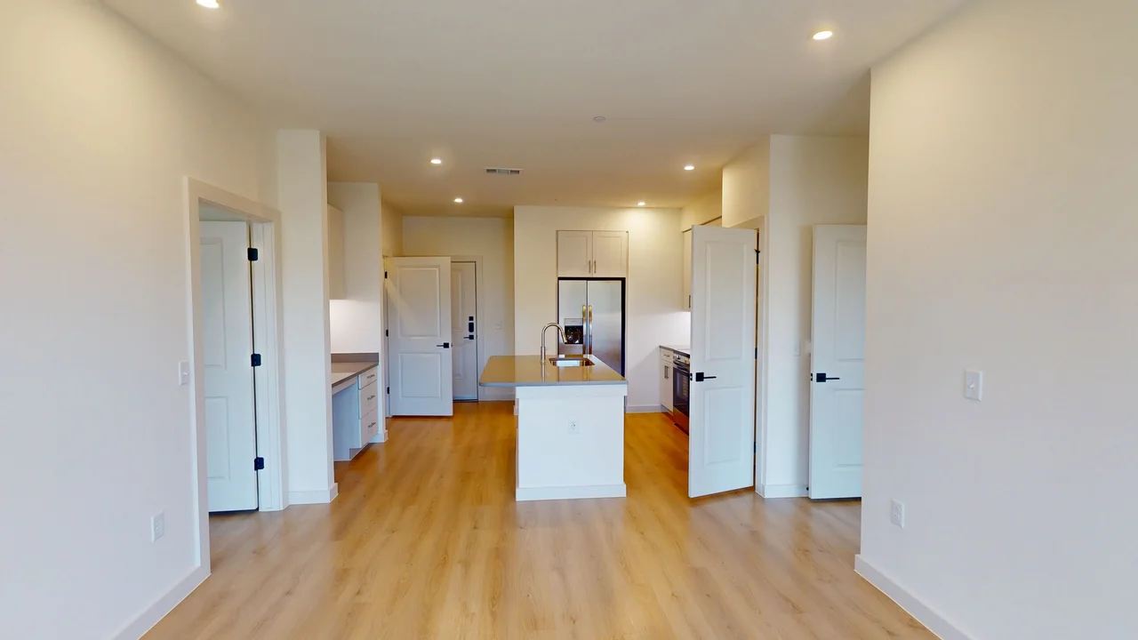Living room of the finished B1 two bedroom at The Parker