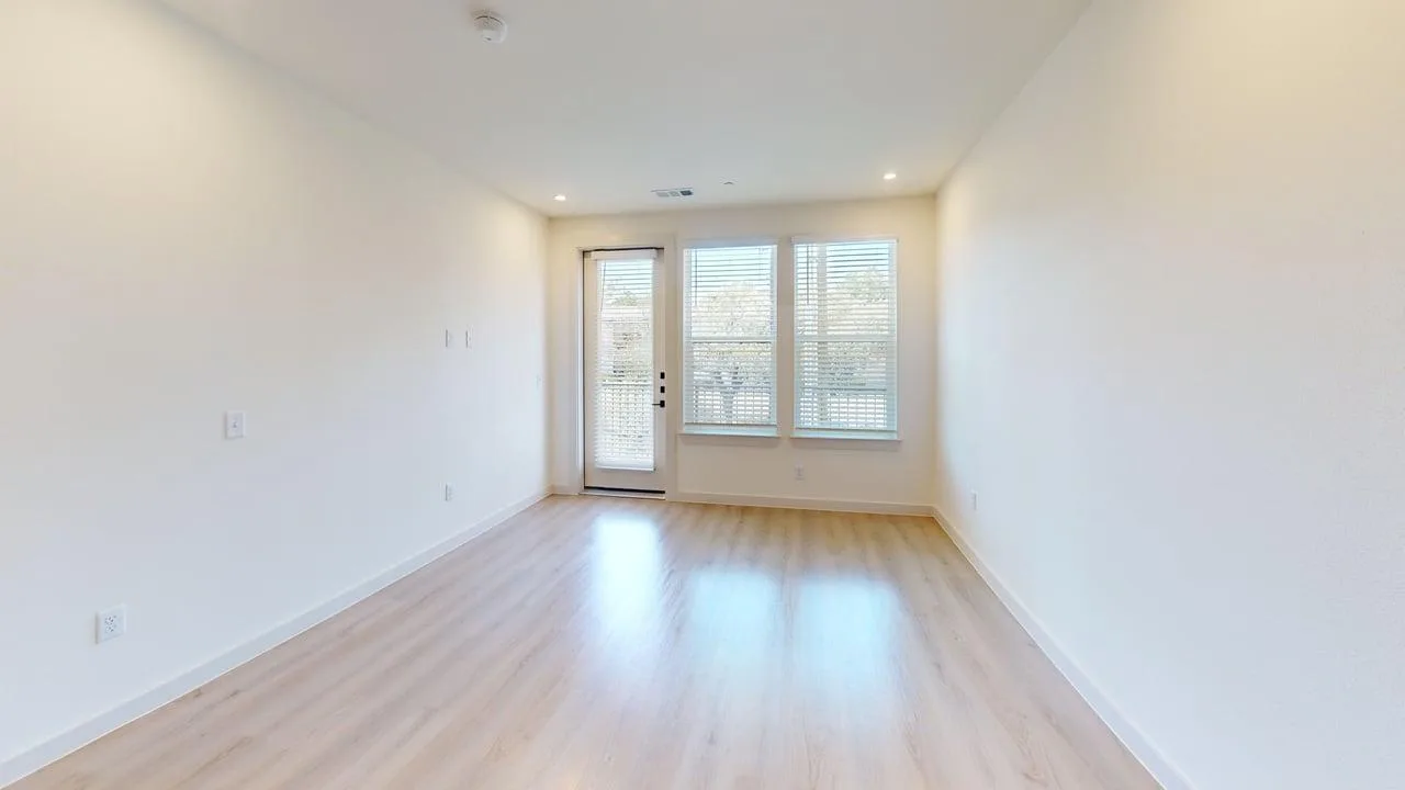 Living room of the finished B1 two bedroom at The Parker