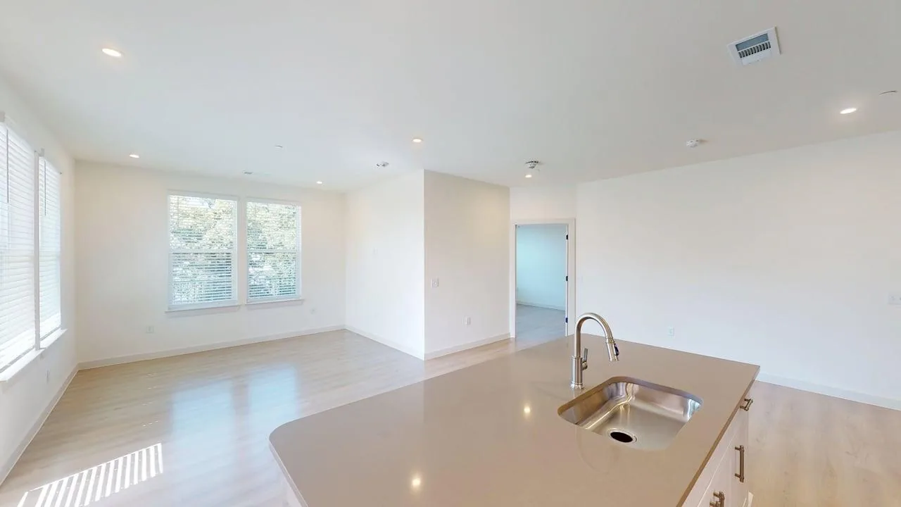 Living room of the finished C1 three bedroom at The Parker