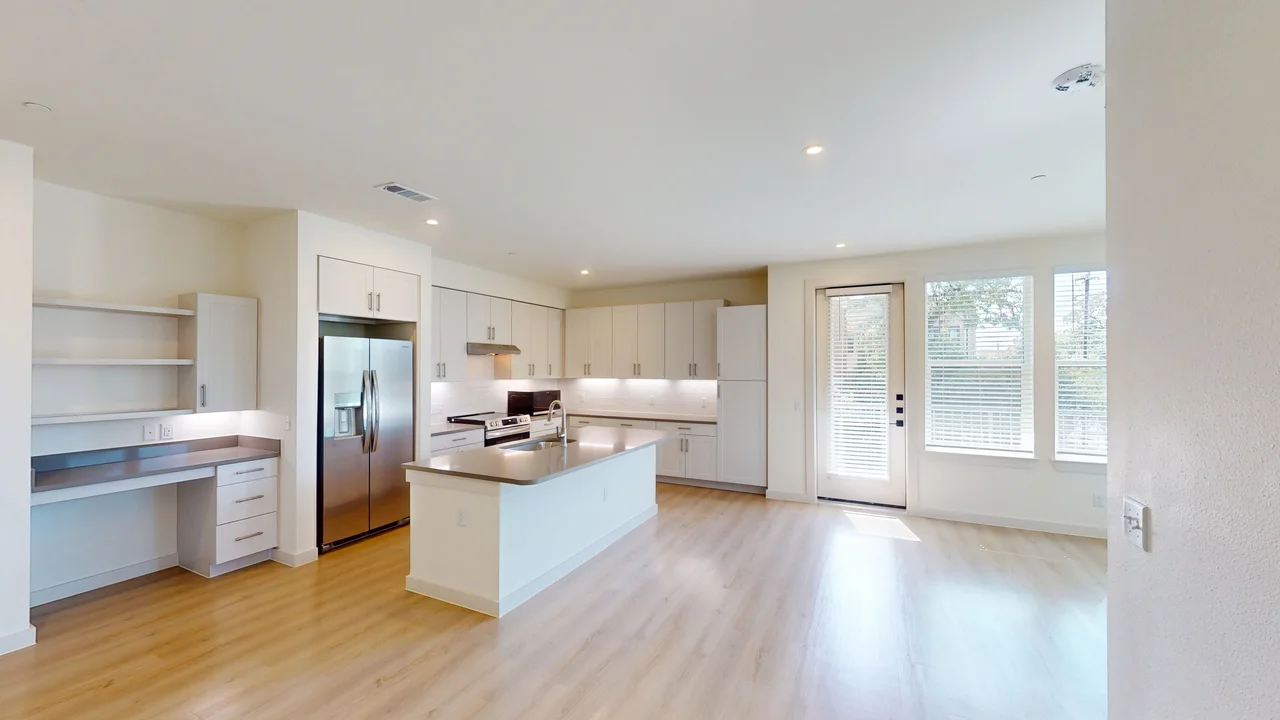 Living room of the finished C1 three bedroom at The Parker