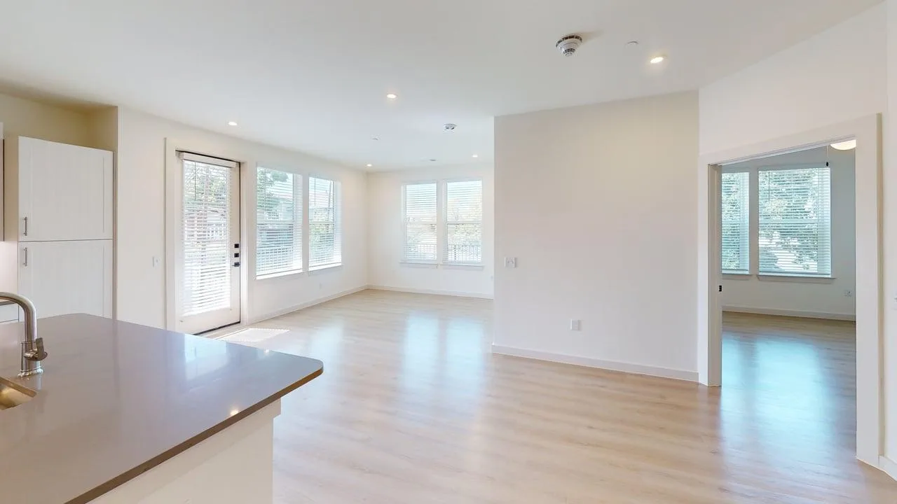 Living room of the finished C1 three bedroom at The Parker