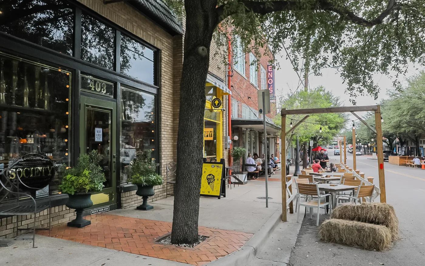 Sidewalk tables outside the shops on North Bishop Avenue